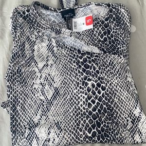Snakeskin long sleeve bodysuit with asymmetrical hole in the at top